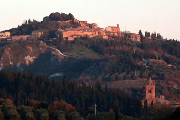 Chiusure on its hill, with the badlands below the village