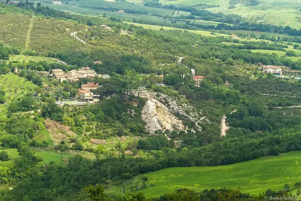 Bagno Vignoni seen from above, with its travertine falls