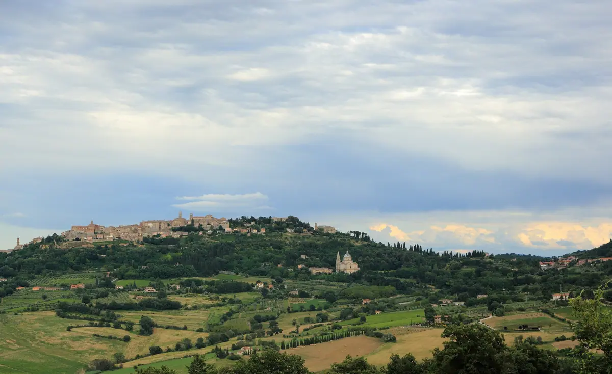 Montepulciano on its hill, with the church of San Biagio below